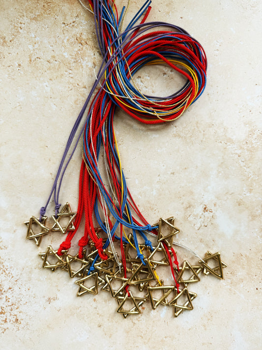 Shield of Love, in brass