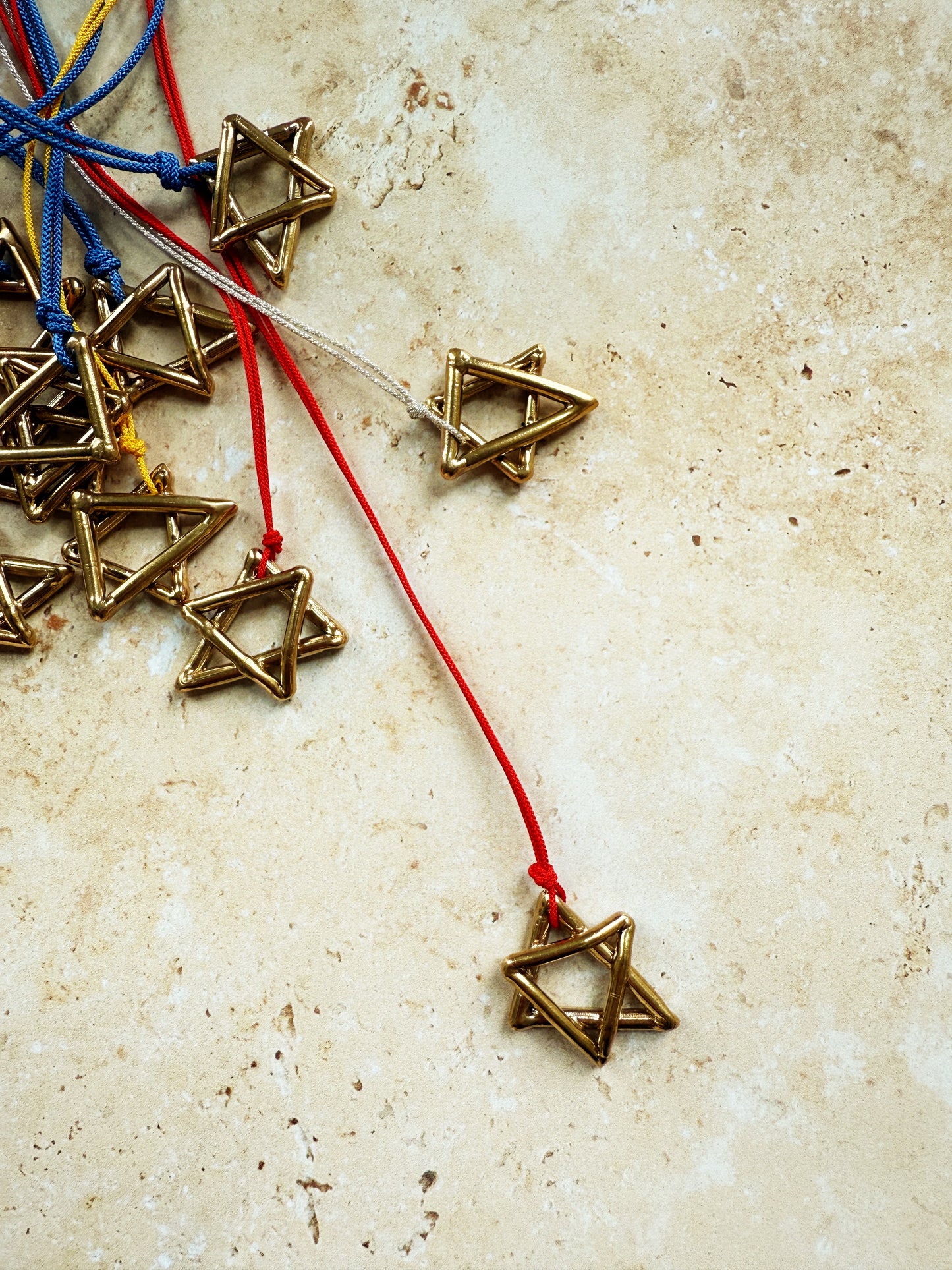 Shield of Love, in brass